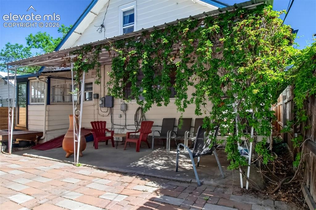 Image 22 of 30: Private back patio
