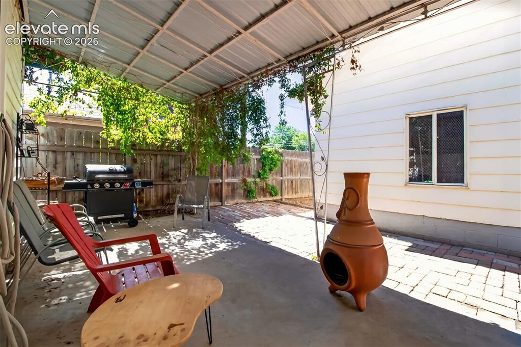 Image 23 of 30: Back patio