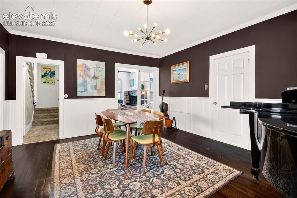Image 7 of 30: Dining room looking into the living room on the front right, versatile side