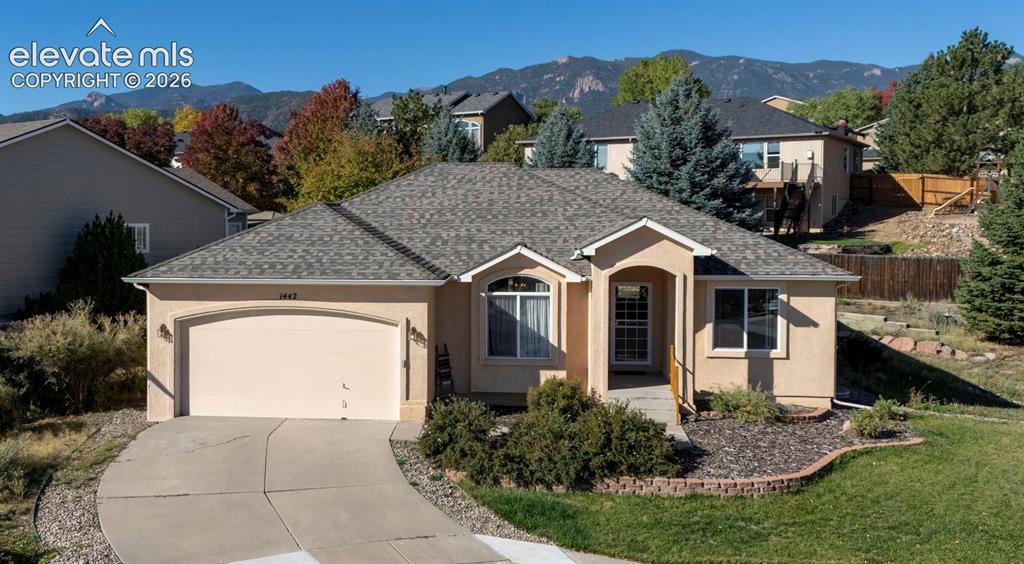Caption: Front Ariel View of Home near Cheyenne Mountain