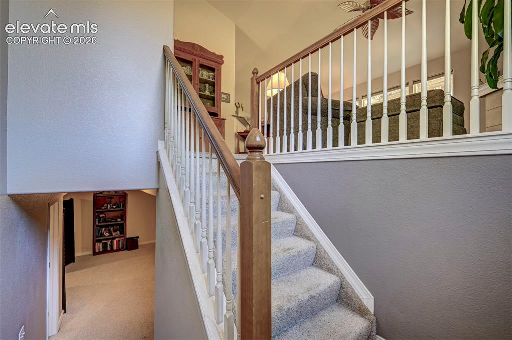 Image 32 of 50: Stairway from Main Level to Lower Living area
