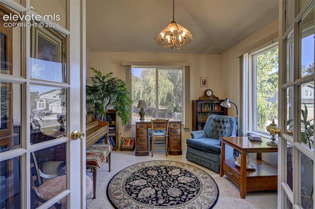 Image 4 of 50: Front Office with French Doors