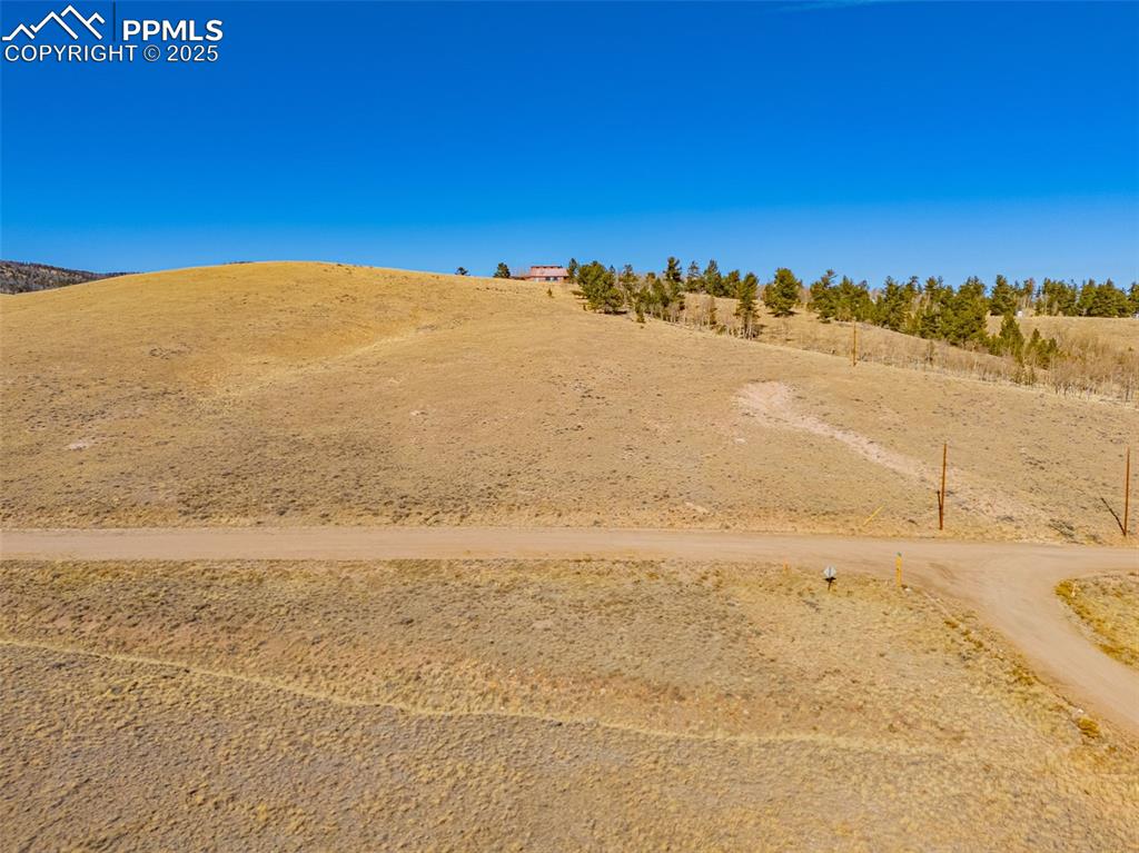 Image 11 of 11: View of yard featuring a rural view