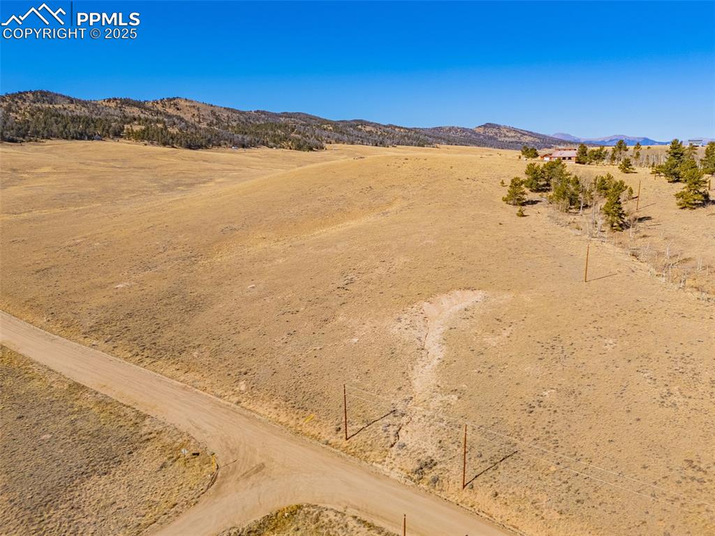 Image 3 of 11: View of mountain background featuring rural landscape and a desert landscap
