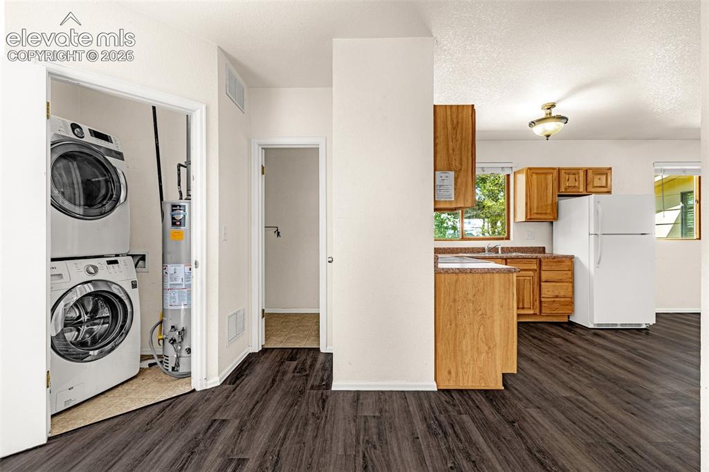 Image 43 of 48: 2nd Kitchen-laundry-living aera