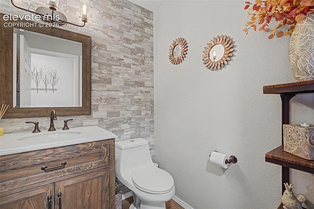 Image 16 of 37: Downstairs powder room