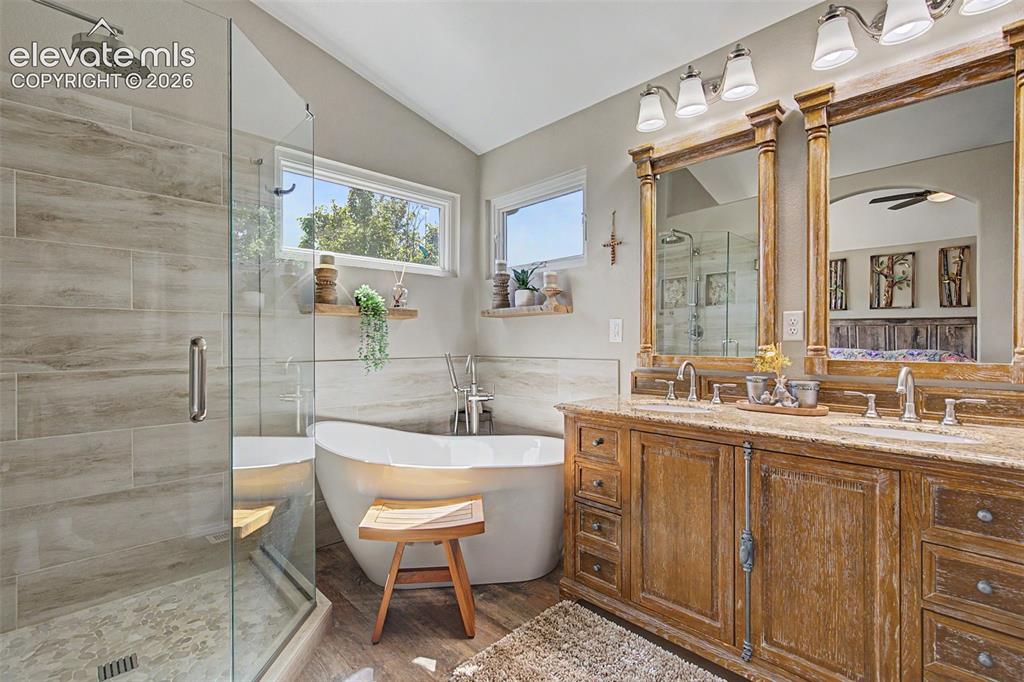 Image 23 of 37: Window facing northwest is an awning window, double vanity, walk-in closet,