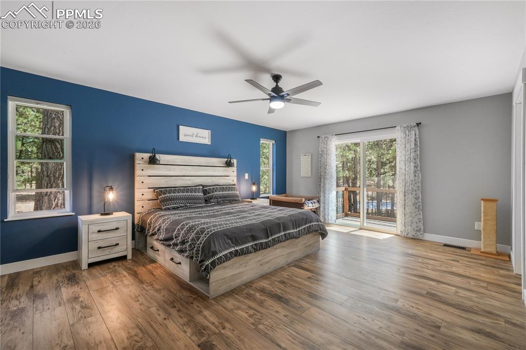 Image 20 of 50: Primary bedroom, ensuite 5 piece bath, private patio, custom walk in closet