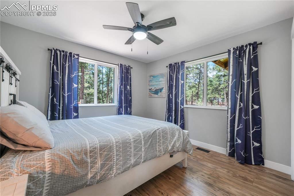 Image 25 of 50: Main level 2nd bedroom