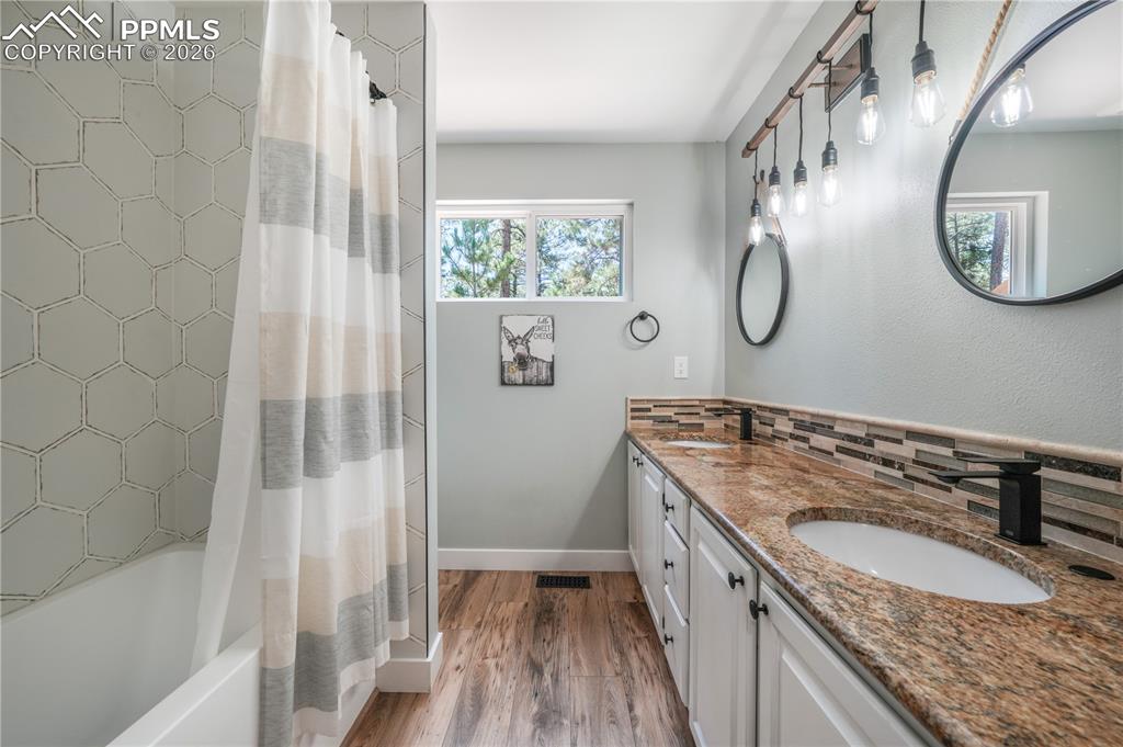 Image 27 of 50: Main level full bathroom