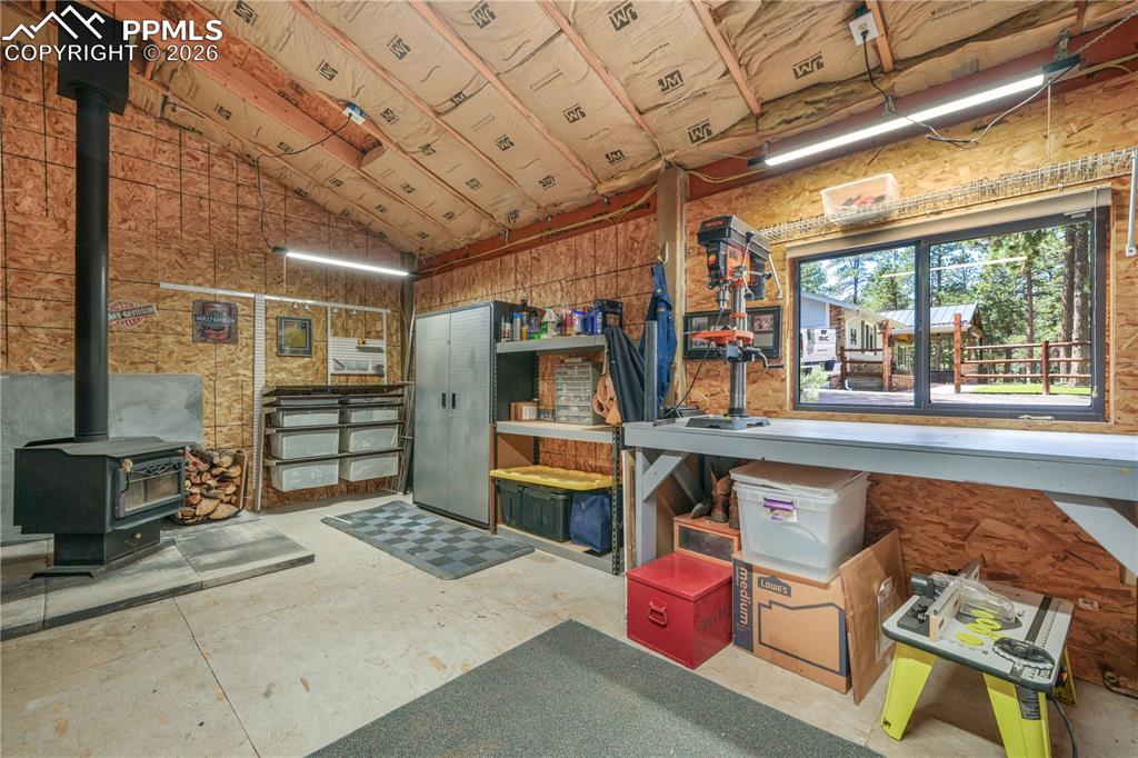 Image 42 of 50: Detached garage with workshop and RV 