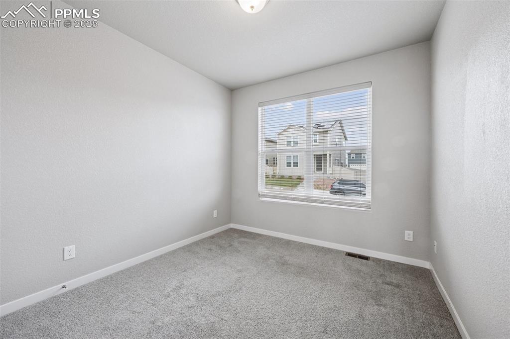 Image 13 of 38: Bedroom