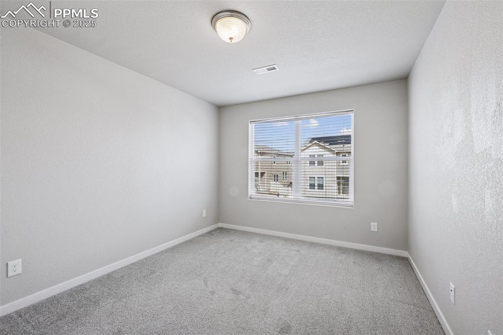 Image 25 of 38: Bedroom