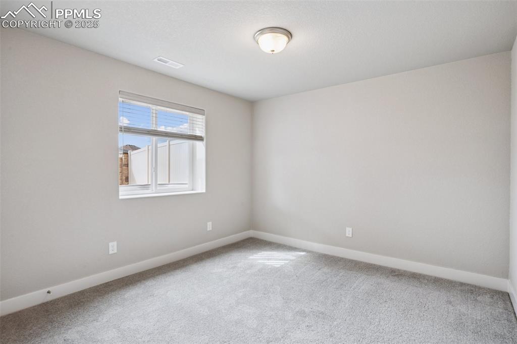 Image 34 of 38: Bedroom