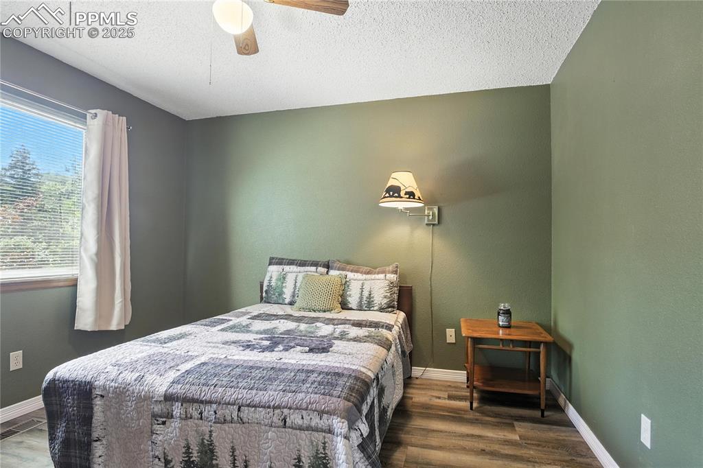 Image 18 of 25: Bedroom with walk-in closet