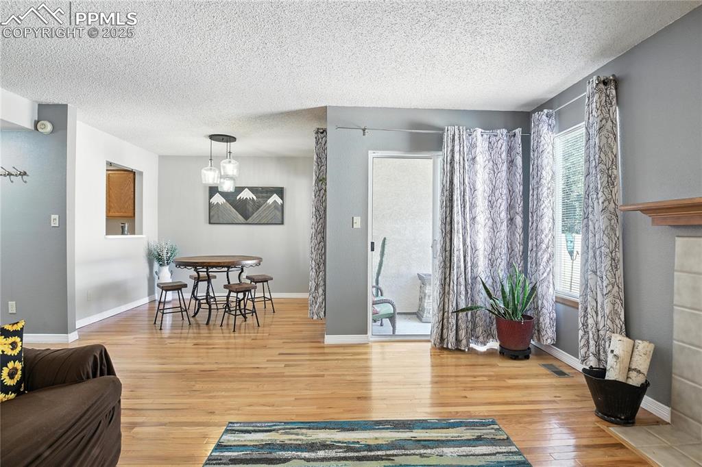 Image 9 of 25: Separate dining area adds flexible living space