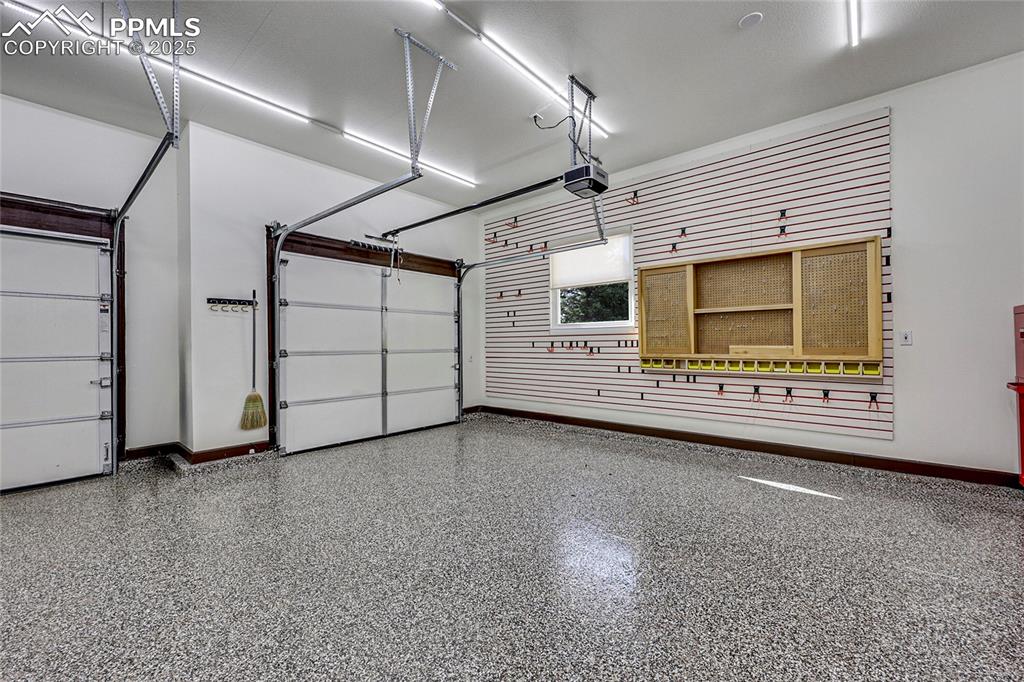 Image 20 of 48: Oversized Garage -Epoxy Coated Flooring-Slat Wall Organizer Included