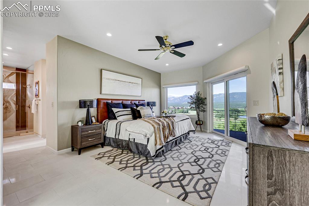 Image 24 of 48: Bedroom with access to outside, recessed lighting, ceiling fan, light tile
