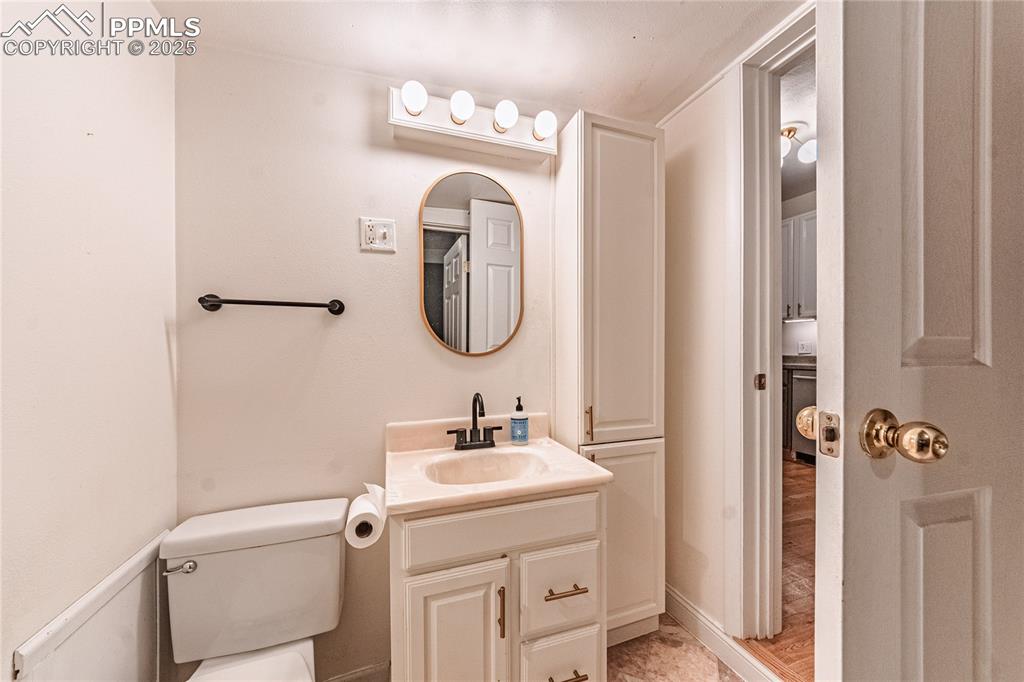 Image 19 of 36: Bathroom featuring vanity and toilet
