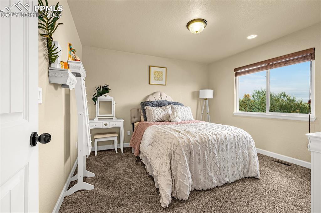 Image 23 of 38: Bedroom