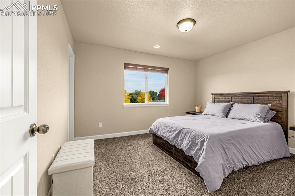 Image 24 of 38: Bedroom