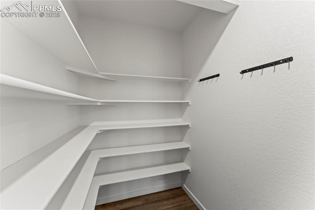 Image 26 of 44: primary closet