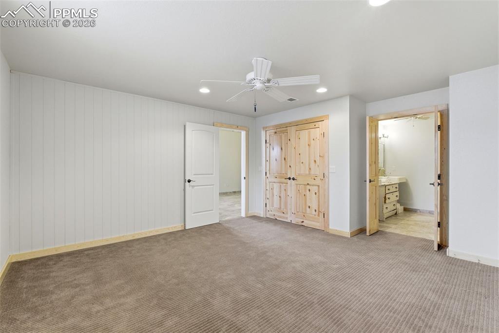 Image 29 of 50: Unfurnished bedroom with recessed lighting, carpet floors, ceiling fan, and
