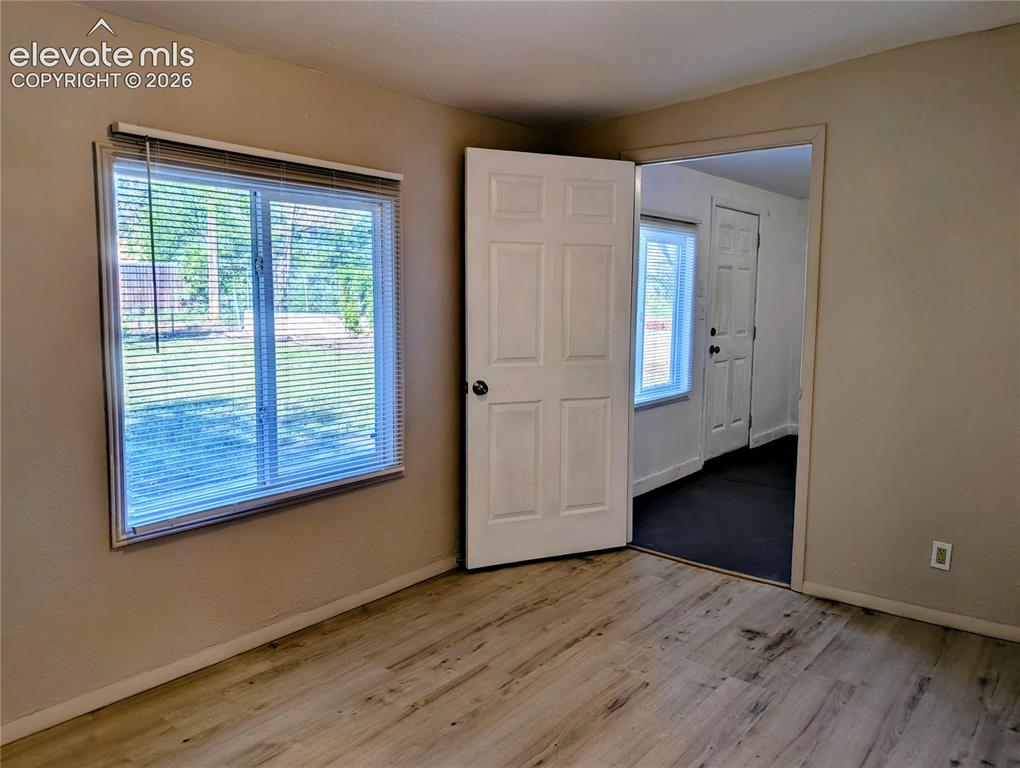 Image 13 of 39: Dining room looking towards laundry room
