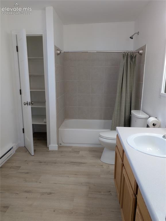 Image 23 of 39: Primary bath with linen closet