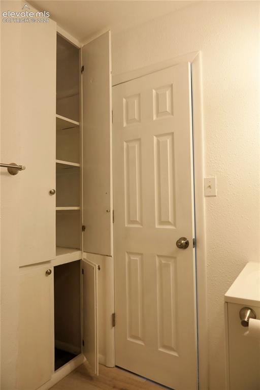 Image 30 of 39: Hallway bathroom storage closet