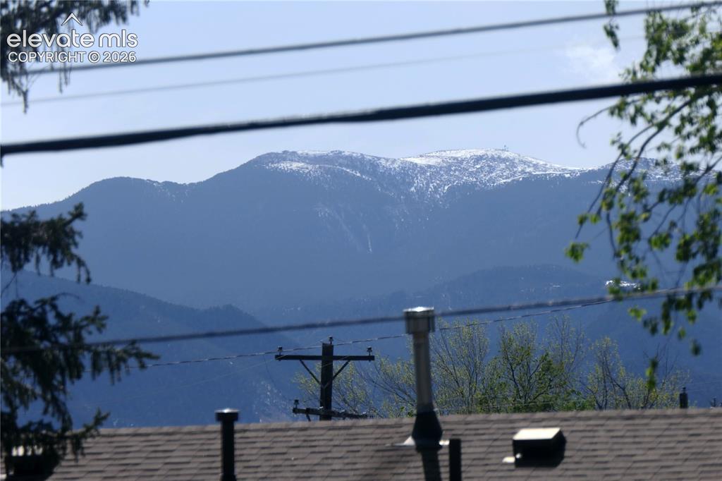 Image 37 of 39: View of mountains from backyard
