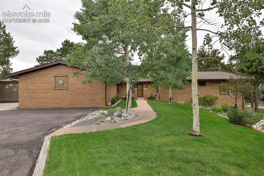 Caption: Mountain Views from this charming brick rancher on a 3/4 acre wooded AND landscaped lot!
