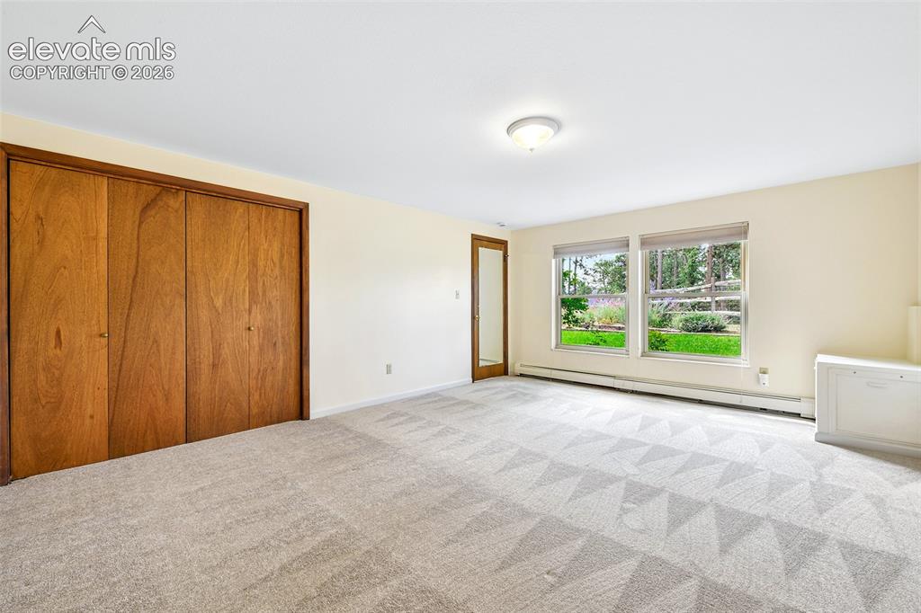 Image 36 of 49: Fourth bedroom with views out window