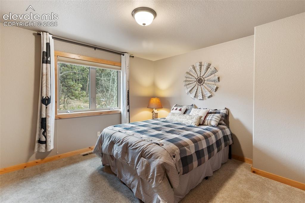 Image 22 of 36: Upper Level 2nd Bedroom