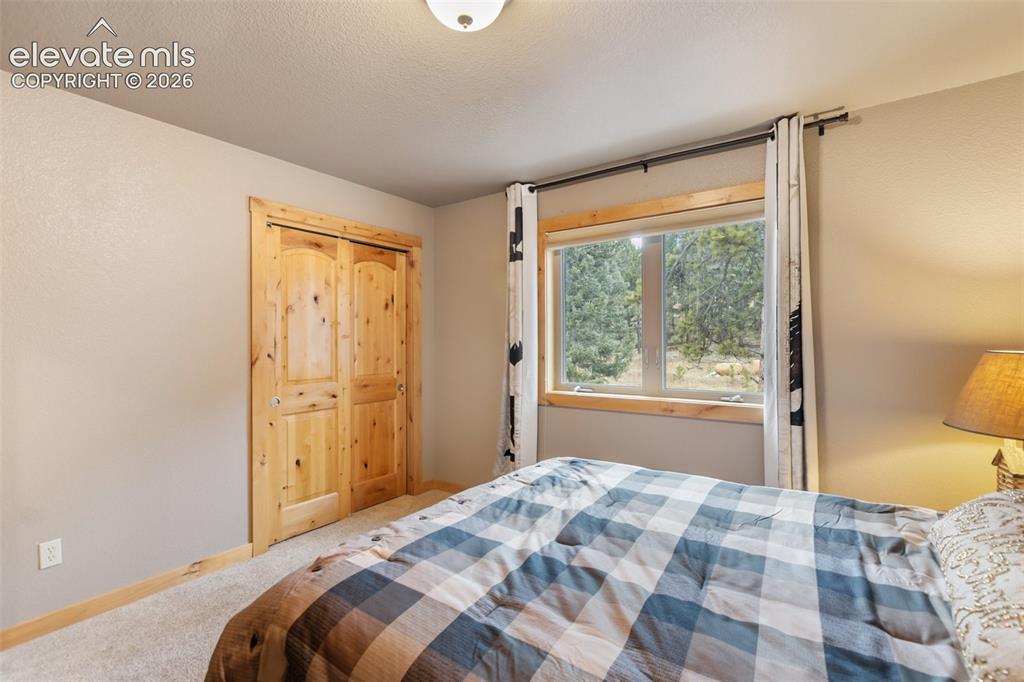 Image 23 of 36: Upper level 2nd Bedroom