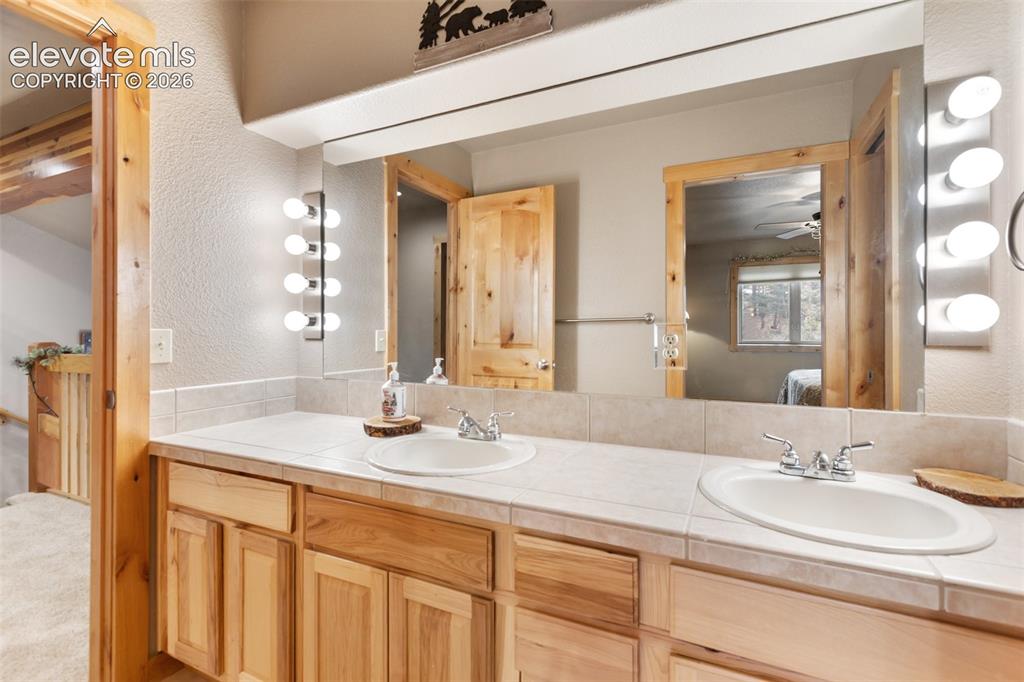 Image 24 of 36: Upper Level Full Bath
