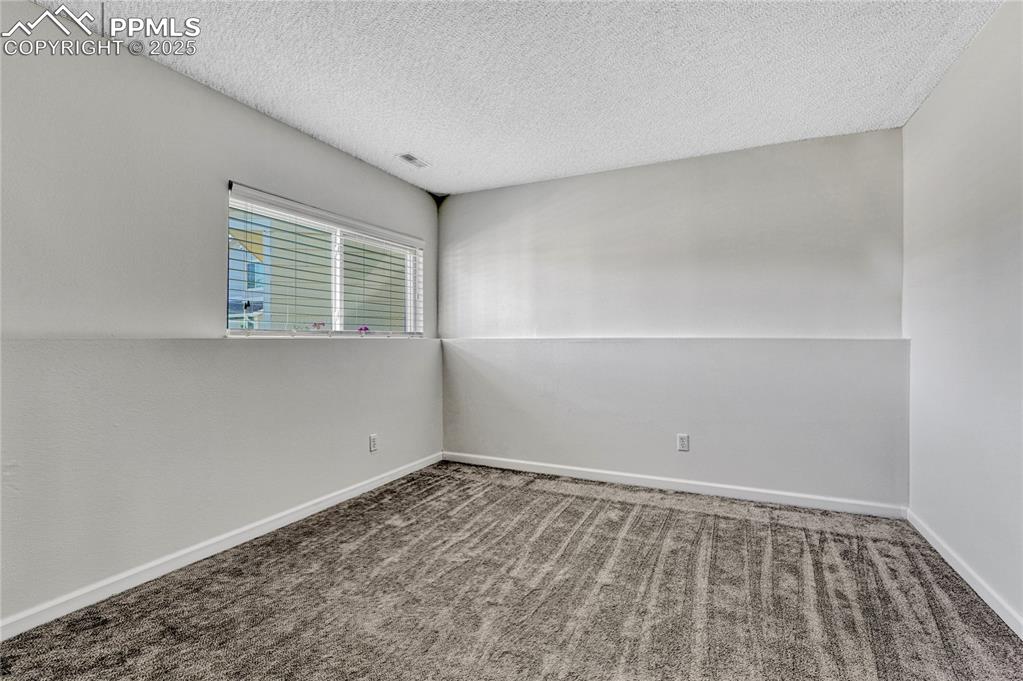 Image 32 of 50: Family Room in Lower Level