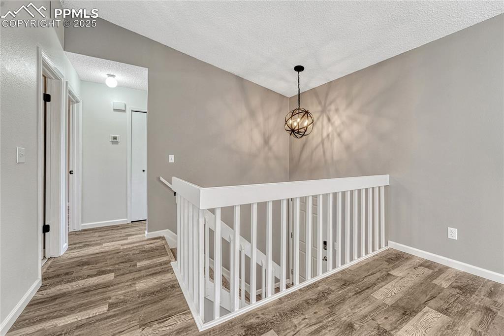 Image 6 of 50: Lower Level Access from Upper Level