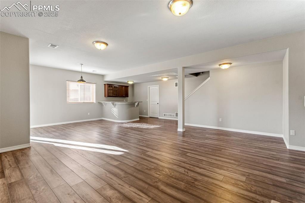 Image 32 of 45: HUGE lower level living room