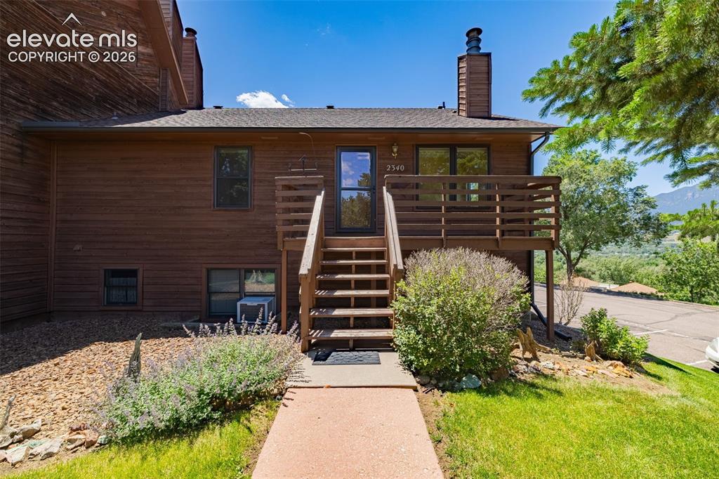 Image 1 of 33: Entrance to the condo with great views of Pikes Peak