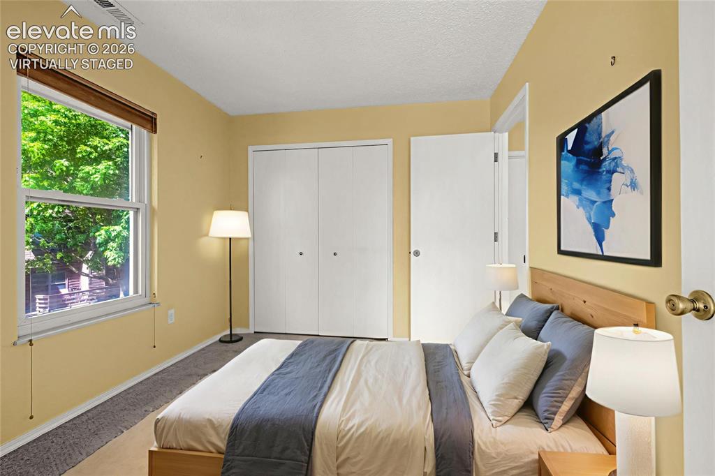 Image 10 of 33: guest bedroom or perfect office - virtually staged