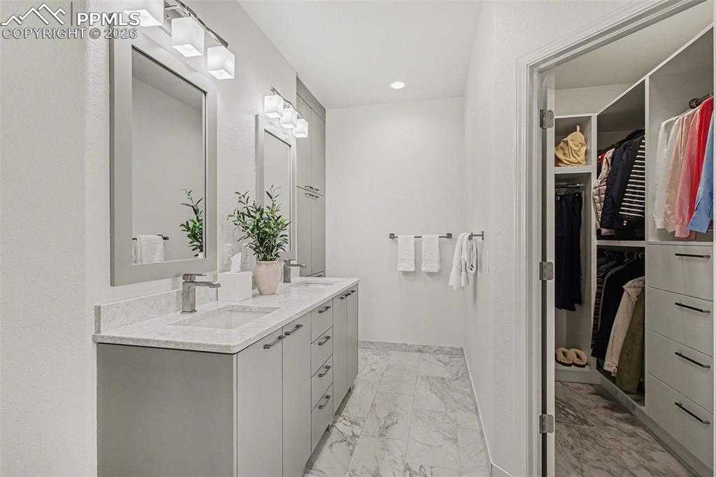 Image 28 of 45: Custom walk in closet