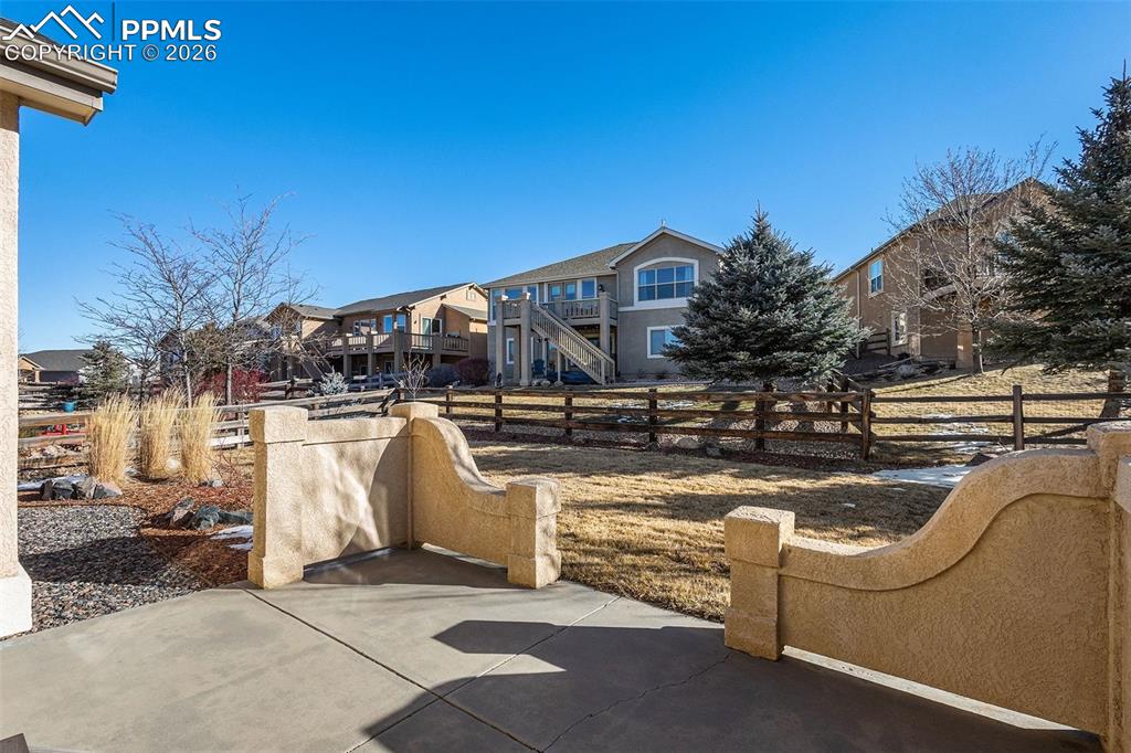 Image 40 of 45: Back patio is perfect for summer BBQs