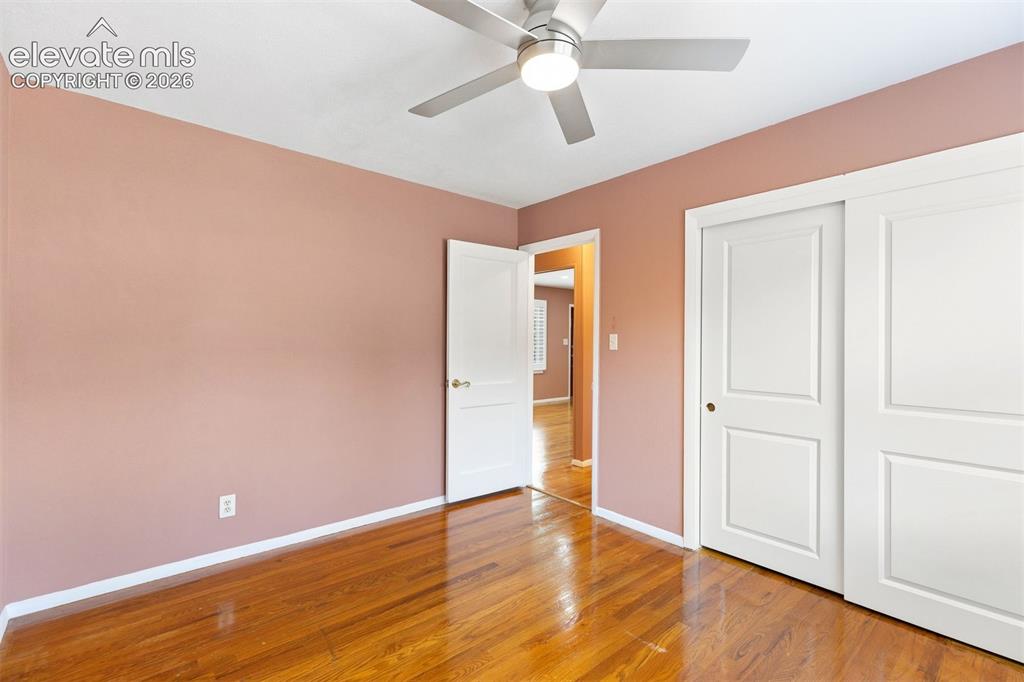 Image 17 of 29: Back bedroom