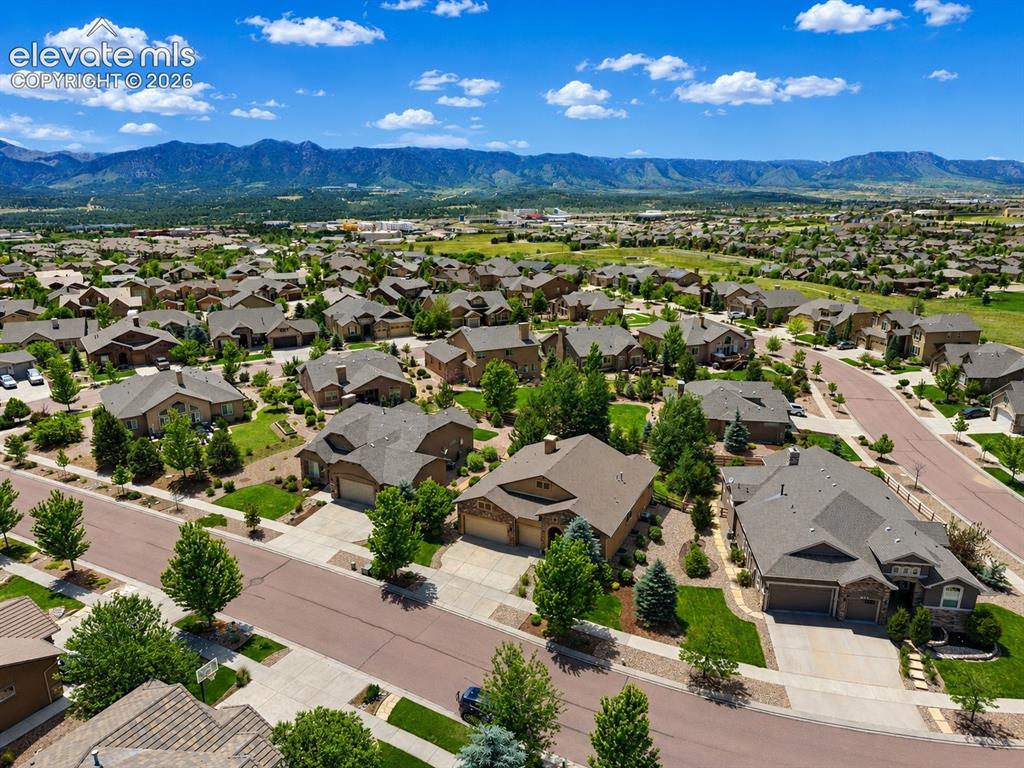 Image 43 of 46: Residential neighborhood with mountain backdrop
