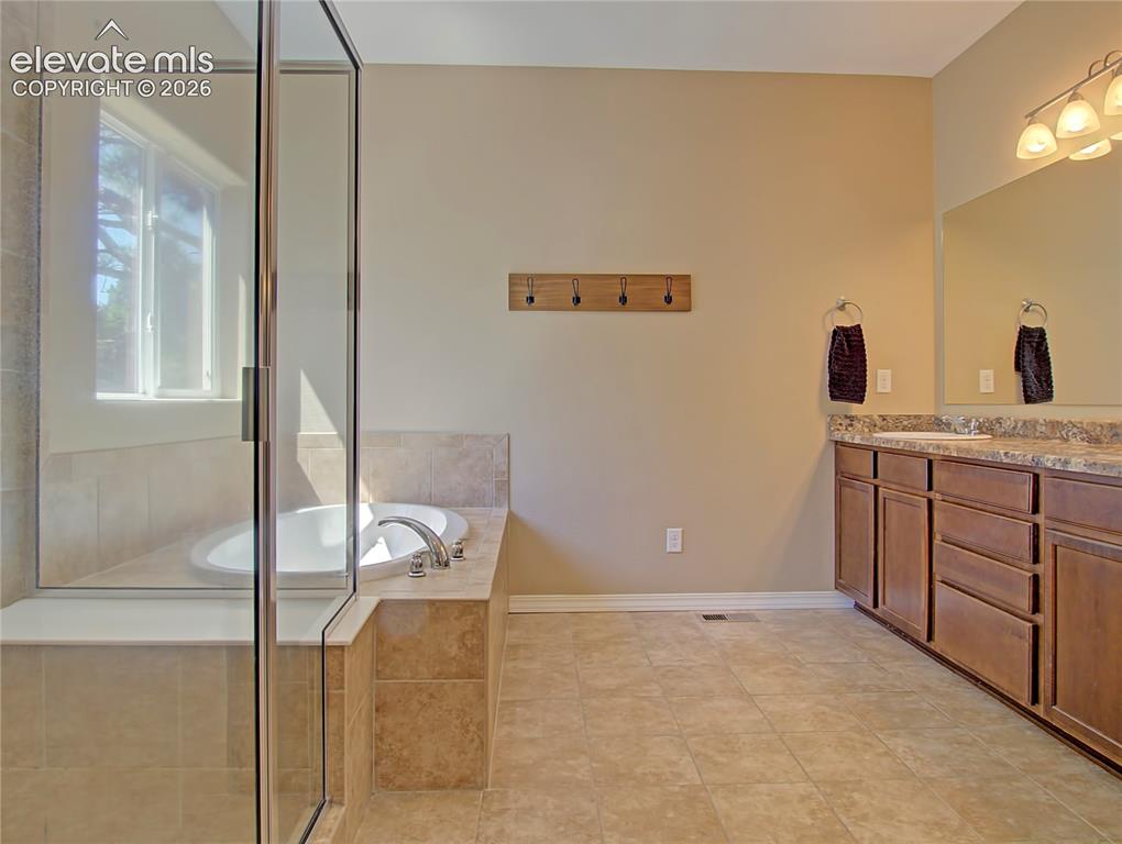 Image 26 of 44: Master Bathroom