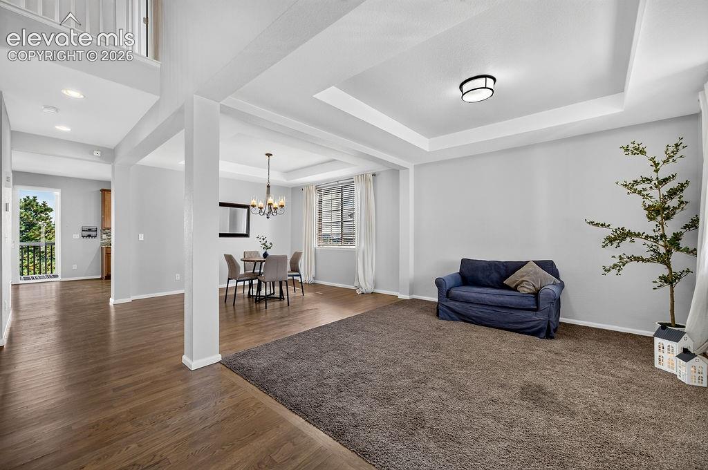 Image 12 of 50: Tray ceiling with recessed lighting