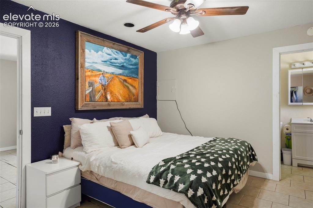 Image 41 of 41: Ceiling fan with integrated lighting, recessed ceiling light, tile flooring