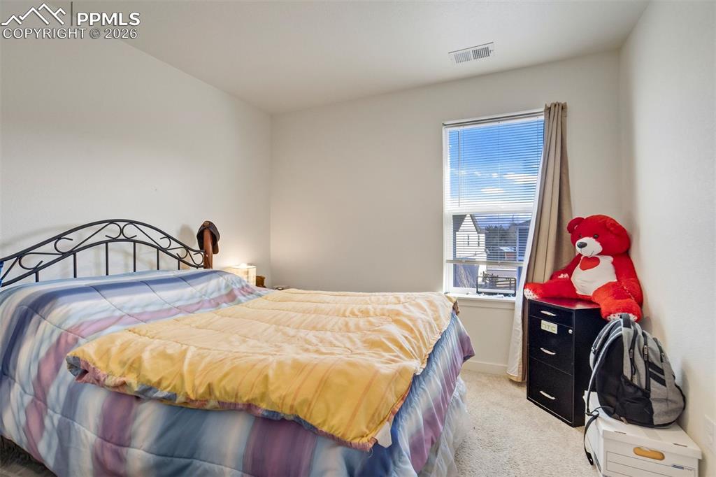 Image 23 of 48: Bedroom