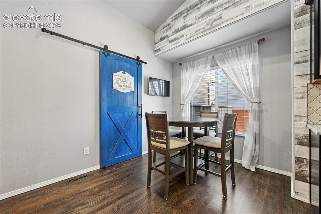Image 14 of 50: Custom barndoor to pantry!